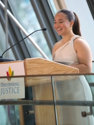 Kate delivering a speech at the federal courthouse in Boston